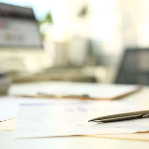 Tax Smart Advisors LLC, Tax & Accounting Firm Serving the Lehigh Valley | Photo: Two people standing at a desk pointing to post-it note